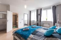 A bed or beds in a room at Cute Red Star Studio City Center