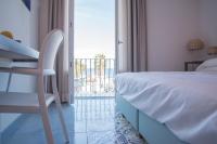 Posteľ alebo postele v izbe v ubytovaní B&B Il Castello