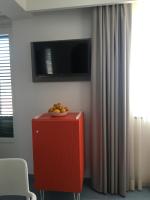 Televízia a/alebo spoločenská miestnosť v ubytovaní B&B Il Castello