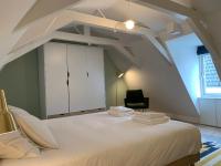 Ein Bett oder Betten in einem Zimmer der Unterkunft Kangaroom