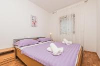 Postel nebo postele na pokoji v ubytování Apartment Matošić