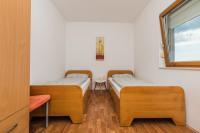 Postel nebo postele na pokoji v ubytování Apartment Matošić