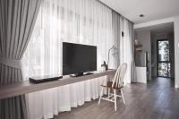 TV a/nebo společenská místnost v ubytování Siambeach Resort