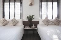 Postel nebo postele na pokoji v ubytování Siambeach Resort