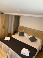 Posteľ alebo postele v izbe v ubytovaní hotel la trainera