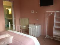 A bed or beds in a room at Appartamenti Monte Alago