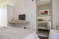 Posteľ alebo postele v izbe v ubytovaní Home Suites Home