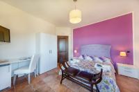 Posteľ alebo postele v izbe v ubytovaní Casa Vacanza Villa Aurora