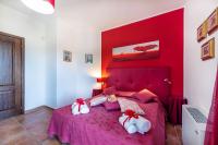 Posteľ alebo postele v izbe v ubytovaní Casa Vacanza Villa Aurora