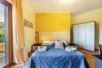 Posteľ alebo postele v izbe v ubytovaní Casa Vacanza Villa Aurora