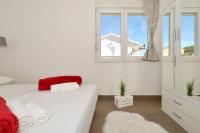 Posteľ alebo postele v izbe v ubytovaní Stunning View Apartment with pool