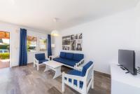 TV a/nebo společenská místnost v ubytování Apartamentos Iris