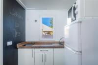 Kuchyň nebo kuchyňský kout v ubytování Apartamentos Iris