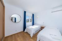 Postel nebo postele na pokoji v ubytování Apartamentos Iris
