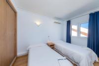 Postel nebo postele na pokoji v ubytování Apartamentos Iris