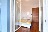 Postel nebo postele na pokoji v ubytování City penthouse Vita
