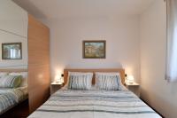 Postel nebo postele na pokoji v ubytování City penthouse Vita