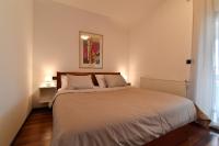 Postel nebo postele na pokoji v ubytování City penthouse Vita