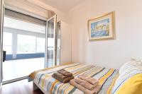 Postel nebo postele na pokoji v ubytování City penthouse Vita