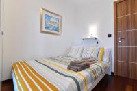 Postel nebo postele na pokoji v ubytování City penthouse Vita
