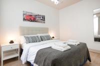 Posteľ alebo postele v izbe v ubytovaní Tendency Apartments 5