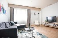 Televízia a/alebo spoločenská miestnosť v ubytovaní Tendency Apartments 5