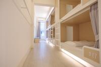 About A Bed Hostel Chiangmaiにあるベッド