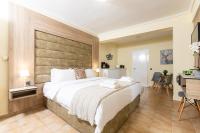 Posteľ alebo postele v izbe v ubytovaní Seven Heaven Premium Suites