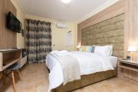 Posteľ alebo postele v izbe v ubytovaní Seven Heaven Premium Suites