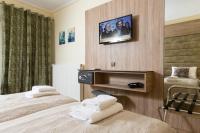 Posteľ alebo postele v izbe v ubytovaní Seven Heaven Premium Suites