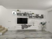 Televízia a/alebo spoločenská miestnosť v ubytovaní Apartment Blue Laguna