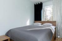 Posteľ alebo postele v izbe v ubytovaní Jantar Apartamenty - Park Side