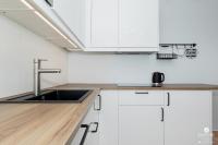 Kuchyňa alebo kuchynka v ubytovaní Jantar Apartamenty - Park Side