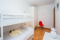 Postel nebo postele na pokoji v ubytování Ereza Villa Matilde