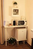 Kuchyňa alebo kuchynka v ubytovaní Il Giardino di Laura Private Rooms Mondello