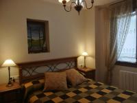 Postel nebo postele na pokoji v ubytování Apartamentos Casa Aneta