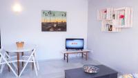 TV a/nebo společenská místnost v ubytování Apartamento Puerto Marina Sun & Relax Benalmádena