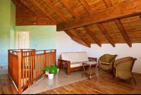 a living room with a couch and a table and chairs at Villa Sole in Anse Volbert Village