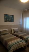 Posteľ alebo postele v izbe v ubytovaní "VACANZA A CASA" - Gallicano & Gallicano2