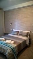 Posteľ alebo postele v izbe v ubytovaní "VACANZA A CASA" - Gallicano & Gallicano2