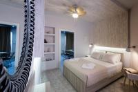 Postel nebo postele na pokoji v ubytování NK Apartments