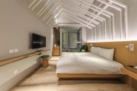 HOTEL PIN Jiaoxiにあるテレビまたはエンターテインメントセンター