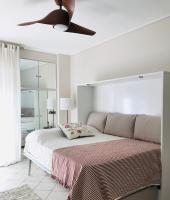 A bed or beds in a room at Stefanias sunny Acropolis Studio on Drakou pedestrian