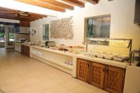 a kitchen with a counter with food on it at Pacifica Resort Ixtapa in Ixtapa