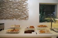 a buffet with different types of food on a counter at Pacifica Resort Ixtapa in Ixtapa