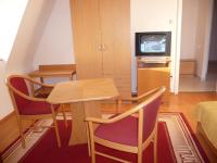 Televízia a/alebo spoločenská miestnosť v ubytovaní BALATON ART Guesthouse