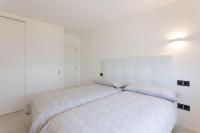 A bed or beds in a room at Maison Ses Covetes