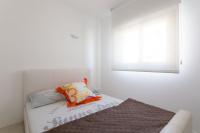 A bed or beds in a room at Maison Ses Covetes