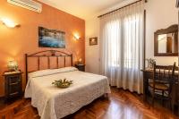 Posteľ alebo postele v izbe v ubytovaní Alba Marina B&B