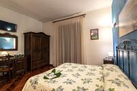 Posteľ alebo postele v izbe v ubytovaní Alba Marina B&B